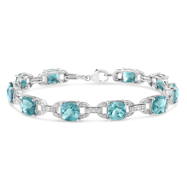 .925 Sterling Silver 7x7 mm Cushion Cut Blue Topaz and 1/20 cttw Round Cut Diamond Fashion Tennis Bracelet (I-J Color, I1-I2 Clarity) - 7