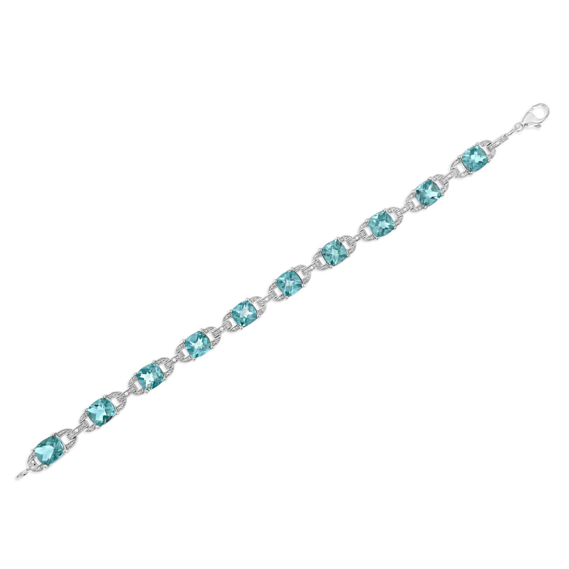 .925 Sterling Silver 7x7 mm Cushion Cut Blue Topaz and 1/20 cttw Round Cut Diamond Fashion Tennis Bracelet (I-J Color, I1-I2 Clarity) - 7"