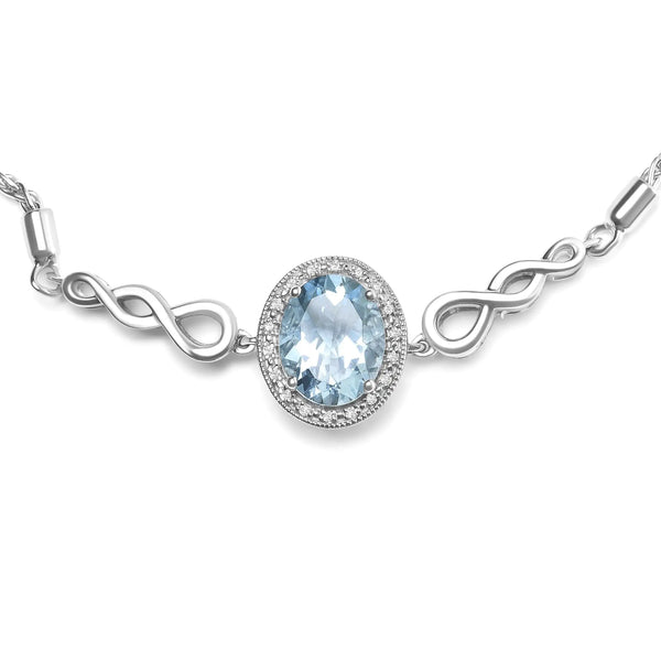 .925 Sterling Silver 10x8mm Oval Blue Topaz and Diamond Accent Lariat 4”-10” Adjustable Bolo Bracelet (H-I Color, SI1-SI2 Clarity)